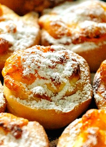 Delicious baked goods sprinkled with icing sugar